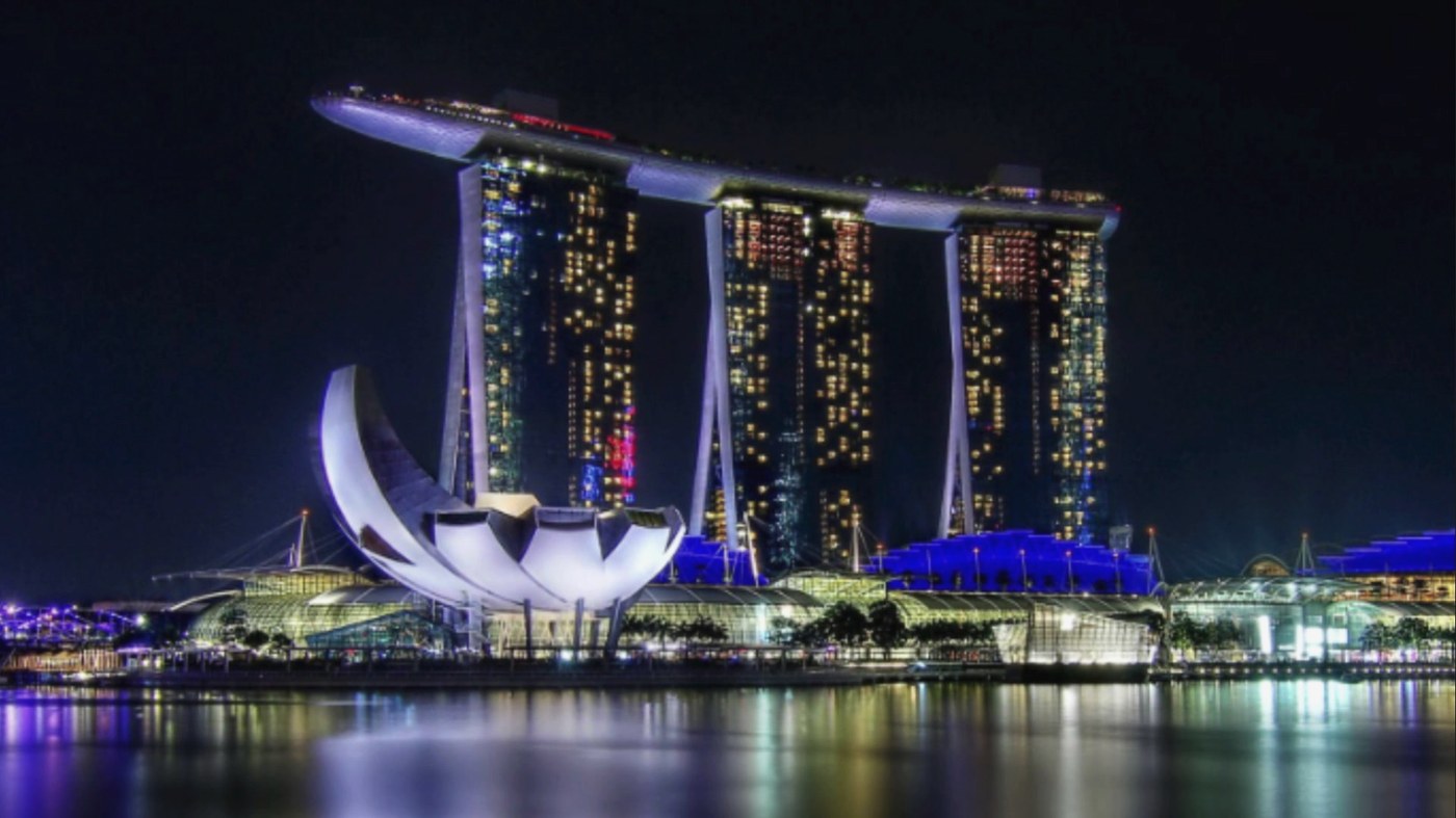 Marina Bay Sands and the ArtScience Museum lit up at night across the water